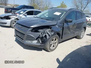 2014 Ford Escape SE with VIN 1FMCU9GX0EUC75145, listed as a IAAI auction lot 42048519 with 186,670 mi miles and . Bid and sale history available at DreamBid. Image 2.
