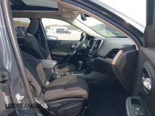 2016 Jeep Cherokee Latitude with VIN 1C4PJMCB2GW357736, listed as a IAAI auction lot 42017755 with 97,650 mi miles. Bid and sale history available at carsss.com. Image 5.