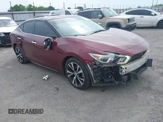 2018 Nissan Maxima SL z VIN 1N4AA6AP8JC381098, wystawiony jako IAAI lot #42075548 z przebiegiem 119 651 mil mil oraz . Historia ofert i sprzedaży dostępna na DreamBid. Obrazek 1.