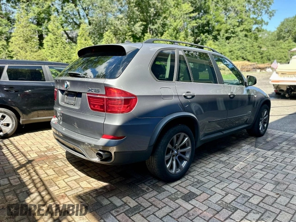 2012 BMW X5 35i with VIN 5UXZV4C55CL986439, listed as a Copart auction lot 63034725 with 188,238 mi miles and Clean title. Bid and sale history available at DreamBid. Image 3.