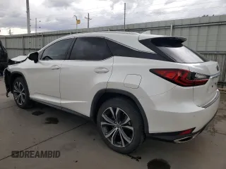 2021 Lexus RX 350 with VIN JTJHZMDA7M2051652, listed as a Copart auction lot 57218985 with 17,013 mi miles and Salvage title. Bid and sale history available at DreamBid. Image 2.