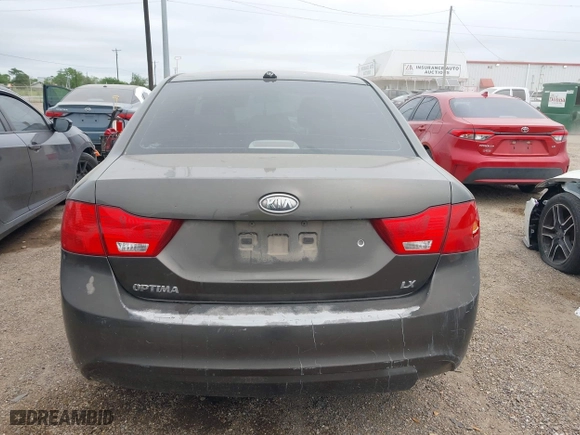 2009 Kia Optima LX with VIN KNAGE228X95299444, listed as a IAAI auction lot 41953241 with 201,170 mi miles. Bid and sale history available at carsss.com. Image 17.