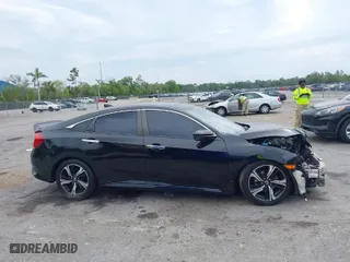2016 Honda Civic Sedan Touring with VIN 19XFC1F92GE007692, listed as a IAAI auction lot 41863790 with 139,537 mi miles. Bid and sale history available at carsss.com. Image 13.