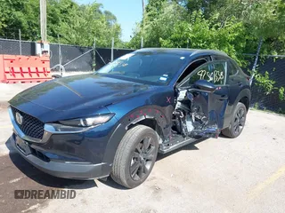 2024 Mazda CX-30 S Select Sport with VIN 3MVDMBBM7RM698178, listed as a IAAI auction lot 42561338 with 25,112 mi miles and . Bid and sale history available at DreamBid. Image 2.