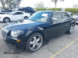 2007 Chrysler 300 with VIN 2C3KA43R57H852331, listed as a IAAI auction lot 41946742 with 211,168 mi miles. Bid and sale history available at carsss.com. Image 18.