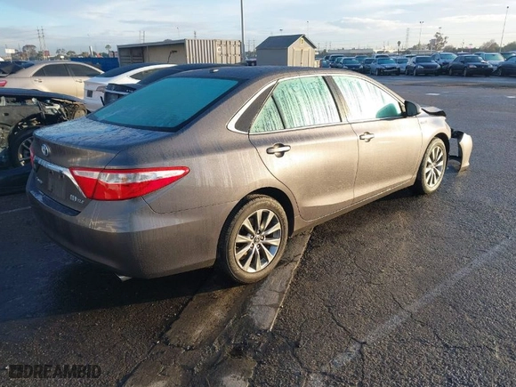 2016 Toyota Camry Hybrid LE with VIN 4T1BD1FK7GU194066, listed as a IAAI auction lot 41425506 with NaN miles. Bid and sale history available at carsss.com. Image 4.