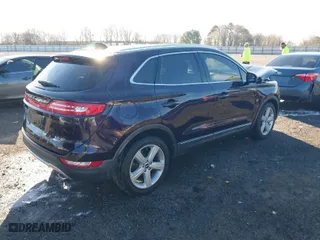 2015 Lincoln MKC with VIN 5LMCJ1A97FUJ18148, listed as a IAAI auction lot 41806694 with 69,677 mi miles. Bid and sale history available at carsss.com. Image 4.