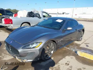 2013 Maserati GranTurismo Sport with VIN ZAM45VLA7D0074506, listed as a IAAI auction lot 41455462 with 34,292 mi miles. Bid and sale history available at carsss.com. Image 2.