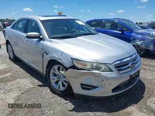 2011 Ford Taurus SEL z VIN 1FAHP2EW2BG138548, wystawiony jako IAAI lot #42350729 z przebiegiem 93 850 mil mil oraz . Historia ofert i sprzedaży dostępna na DreamBid. Obrazek 1.
