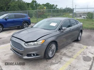 2013 Ford Fusion Titanium with VIN 3FA6P0K94DR192780, listed as a IAAI auction lot 42631746 with 88,994 mi miles and . Bid and sale history available at DreamBid. Image 2.
