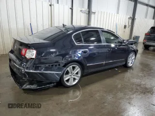 2010 Volkswagen Passat z VIN WVWJK9AN4AE096359, wystawiony jako Copart lot #50740075 z przebiegiem 196 126 mil mil oraz Szkoda całkowita • Salvage title. Historia ofert i sprzedaży dostępna na DreamBid. Obrazek 3.