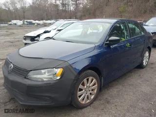 2014 Volkswagen Jetta Sedan S with VIN 3VW1K7AJ2EM421637, listed as a IAAI auction lot 41915643 with 127,258 mi miles. Bid and sale history available at carsss.com. Image 2.