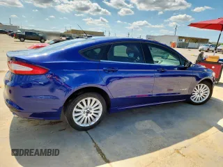 2013 Ford Fusion SE Hybrid with VIN 3FA6P0LU0DR273438, listed as a Copart auction lot 60033665 with 74,474 mi miles and Salvage title. Bid and sale history available at DreamBid. Image 3.