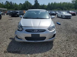 2012 Hyundai Accent GLS z VIN KMHCT4AEXCU081121, wystawiony jako Copart lot #54296235 z przebiegiem 168 986 mil mil oraz Szkoda całkowita • Salvage title. Historia ofert i sprzedaży dostępna na DreamBid. Obrazek 5.