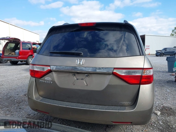 2013 Honda Odyssey EX z VIN 5FNRL5H40DB038886, wystawiony jako IAAI lot #41761738 z przebiegiem 244 107 mil mil oraz . Historia ofert i sprzedaży dostępna na DreamBid. Obrazek 16.