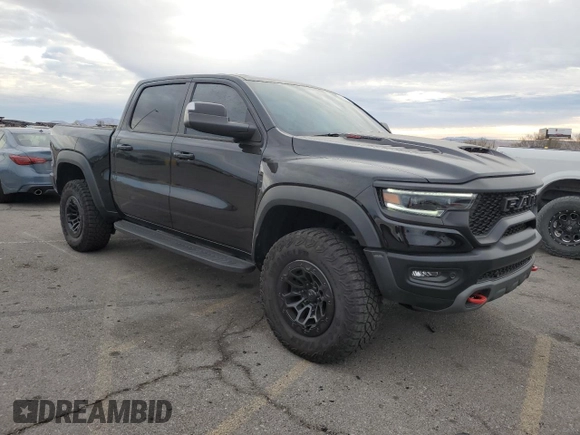2024 Ram 1500 TRX with VIN 1C6SRFU94RN135421, listed as a Copart auction lot 82037944 with 6,969 mi miles and Salvage Title. Bid and sale history available at carsss.com. Image 4.