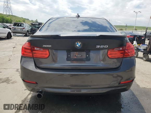 2014 BMW 3 Series 320i xDrive with VIN WBA3C3C53EK200375, listed as a Copart auction lot 59915595 with 104,320 mi miles and Salvage title. Bid and sale history available at DreamBid. Image 6.