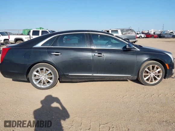 2014 Cadillac XTS Luxury with VIN 2G61M5S35E9228802, listed as a IAAI auction lot 42542501 with 106,506 mi miles and . Bid and sale history available at DreamBid. Image 13.