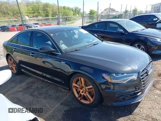 2015 Audi A6 3.0T Prestige with VIN WAUHGAFCXFN016818, listed as a IAAI auction lot 39318101 with 108,617 mi miles. Bid and sale history available at carsss.com. Image 1.