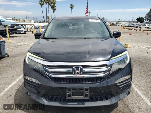 2017 Honda Pilot EX-L with VIN 5FNYF5H50HB000771, listed as a Copart auction lot 52611255 with 84,922 mi miles and Salvage Title. Bid and sale history available at carsss.com. Image 5.