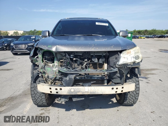 2010 Lexus GX 460 Premium with VIN JTJJM7FX5A5011762, listed as a Copart auction lot 56207715 with 185,360 mi miles and Salvage title. Bid and sale history available at DreamBid. Image 5.