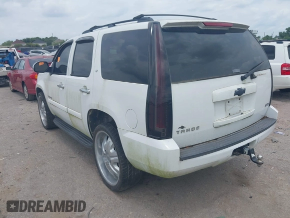2009 Chevrolet Tahoe 2LT z VIN 1GNFC23059R156494, wystawiony jako IAAI lot #42423722 z przebiegiem Nie podano mil oraz . Historia ofert i sprzedaży dostępna na DreamBid. Obrazek 3.