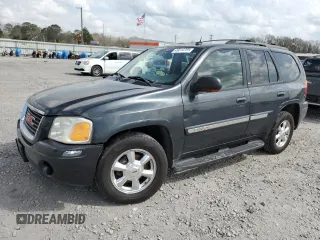 2004 GMC Envoy SLT with VIN 1GKDS13S742444571, listed as a Copart auction lot 49214705 with 217,636 mi miles and Salvage Title. Bid and sale history available at carsss.com. Image 1.