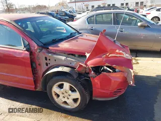 2008 Dodge Caliber SE with VIN 1B3HB28C78D660078, listed as a IAAI auction lot 40999360 with 174,027 mi miles. Bid and sale history available at carsss.com. Image 6.