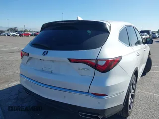 2022 Acura MDX w/Technology Package with VIN 5J8YD9H48NL000743, listed as a IAAI auction lot 41817644 with 69,800 mi miles. Bid and sale history available at carsss.com. Image 4.