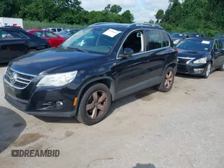 2010 Volkswagen Tiguan with VIN WVGAV9AX4AW513705, listed as a IAAI auction lot 42756432 with 212,980 mi miles and . Bid and sale history available at DreamBid. Image 2.