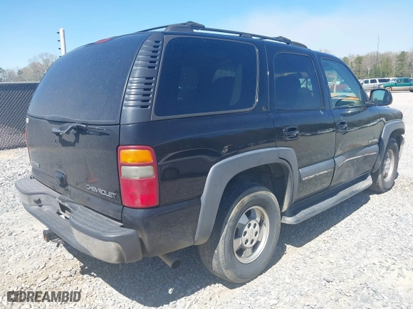 2002 Chevrolet Tahoe LT with VIN 1GNEC13Z42R245581, listed as a IAAI auction lot 41810788 with 228,166 mi miles. Bid and sale history available at carsss.com. Image 4.