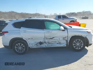 2019 Hyundai Santa Fe SE with VIN 5NMS2CAD4KH118545, listed as a IAAI auction lot 41686797 with 54,108 mi miles and . Bid and sale history available at DreamBid. Image 13.