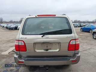 1999 Lexus LX 470 z VIN JT6HT00W8X0045705, wystawiony jako IAAI lot #42005587 z przebiegiem 443 758 mil mil oraz . Historia ofert i sprzedaży dostępna na DreamBid. Obrazek 16.