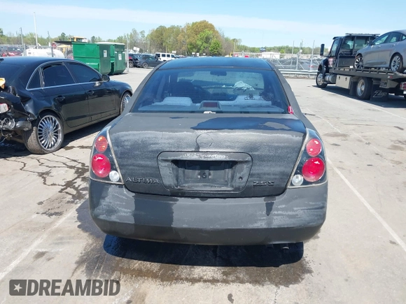 2003 Nissan Altima S with VIN 1N4AL11D03C129562, listed as a IAAI auction lot 41911150 with 205,862 mi miles. Bid and sale history available at carsss.com. Image 16.