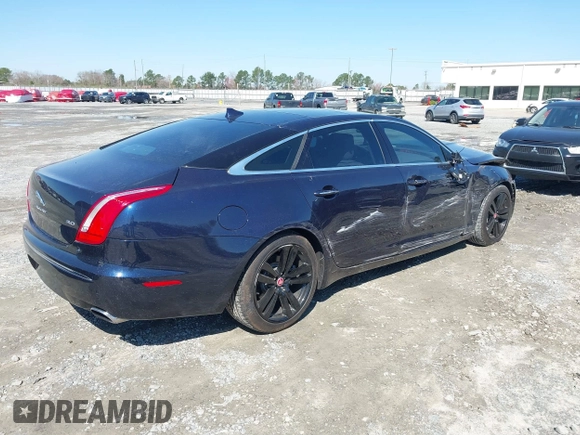2014 Jaguar XJ Portfolio with VIN SAJWA2GZ4E8V60251, listed as a IAAI auction lot 41778702 with 45,180 mi miles and . Bid and sale history available at DreamBid. Image 4.
