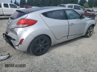 2012 Hyundai Veloster w/Black Int с VIN KMHTC6AD2CU063070, выставлен на аукционе Copart как лот 60391315 с пробегом 153 745 миль миль и Списание • Salvage title. История ставок и продаж доступна на DreamBid. Изображение 3.