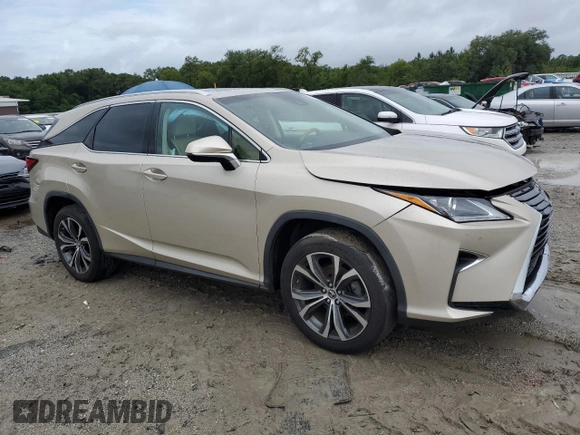 2019 Lexus RX 350L Premium with VIN JTJGZKCA0K2009452, listed as a Copart auction lot 61174785 with 60,403 mi miles and Salvage title. Bid and sale history available at DreamBid. Image 4.