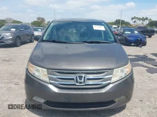 2012 Honda Odyssey Touring with VIN 5FNRL5H90CB088536, listed as a IAAI auction lot 42102008 with 283,350 mi miles and . Bid and sale history available at DreamBid. Image 12.