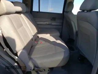 2006 Dodge Durango SXT с VIN 1D4HD38N36F174615, выставлен на аукционе Copart как лот 50635315 с пробегом 152 572 миль миль и Списание • Salvage title. История ставок и продаж доступна на DreamBid. Изображение 11.