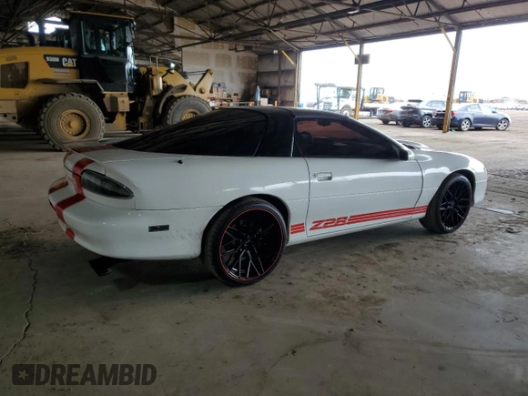 2001 Chevrolet Camaro Z28 z VIN 2G1FP22G612106148, wystawiony jako Copart lot #51154555 z przebiegiem 81 209 mil mil oraz Szkoda całkowita • Salvage title. Historia ofert i sprzedaży dostępna na DreamBid. Obrazek 3.