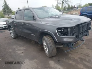 2022 Ram 1500 Laramie with VIN 1C6SRFJT3NN400159, listed as a IAAI auction lot 42167812 with 16,790 mi miles and . Bid and sale history available at DreamBid. Image 1.