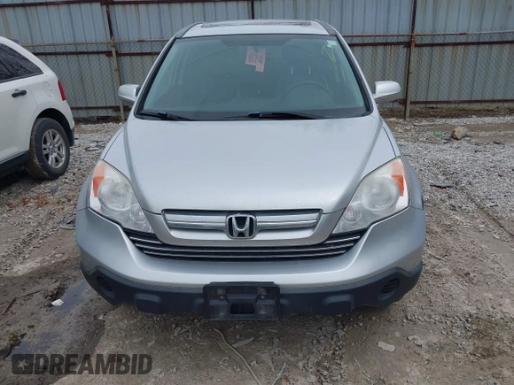 2009 Honda CR-V EX-L with VIN JHLRE487X9C021566, listed as a IAAI auction lot 42008321 with 128,647 mi miles and . Bid and sale history available at carsss.com. Image 12.