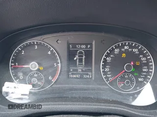 2014 Volkswagen Passat SEL Premium z VIN 1VWCN7A33EC013425, wystawiony jako IAAI lot #41381958 z przebiegiem 104 692 mil mil oraz . Historia ofert i sprzedaży dostępna na DreamBid. Obrazek 7.