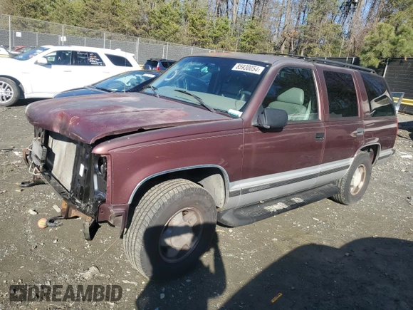 1997 GMC Yukon with VIN 1GKEK13R1VJ702558, listed as a Copart auction lot 85930054 with 165,837 mi miles and Salvage Title. Bid and sale history available at carsss.com. Image 1.