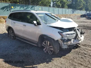 2017 Honda Pilot Touring with VIN 5FNYF6H95HB030731, listed as a Copart auction lot 47133765 with Not Provided miles and Salvage Title. Bid and sale history available at DreamBid. Image 4.