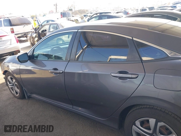 2017 Honda Civic LX z VIN 2HGFC2F53HH538362, wystawiony jako IAAI lot #42095715 z przebiegiem 156 799 mil mil oraz . Historia ofert i sprzedaży dostępna na DreamBid. Obrazek 15.