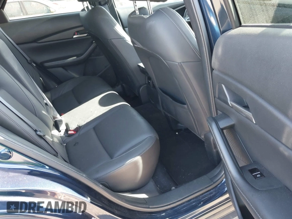 2023 Mazda CX-30 S Select with VIN 3MVDMBBM4PM558831, listed as a IAAI auction lot 42432750 with 12,468 mi miles and . Bid and sale history available at DreamBid. Image 8.