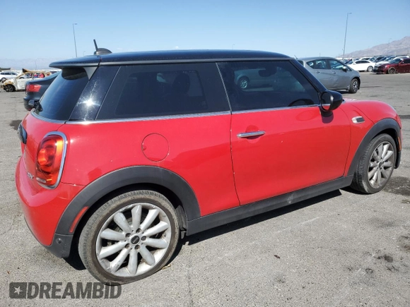 2021 MINI Hardtop Oxford Edition with VIN WMWXR3C09M2N13515, listed as a Copart auction lot 58490325 with 77,064 mi miles and Salvage title. Bid and sale history available at DreamBid. Image 3.