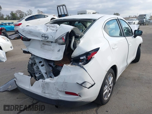 2016 Scion iA z VIN 3MYDLBZV9GY139080, wystawiony jako IAAI lot #41494384 z przebiegiem 106 092 mil mil oraz . Historia ofert i sprzedaży dostępna na DreamBid. Obrazek 4.