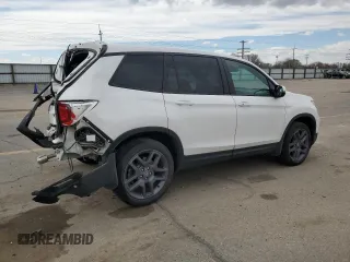 2023 Honda Passport EX-L z VIN 5FNYF8H56PB023651, wystawiony jako Copart lot #51015165 z przebiegiem 24 144 mil mil oraz Szkody całkowita. Historia ofert i sprzedaży dostępna na DreamBid. Obrazek 3.